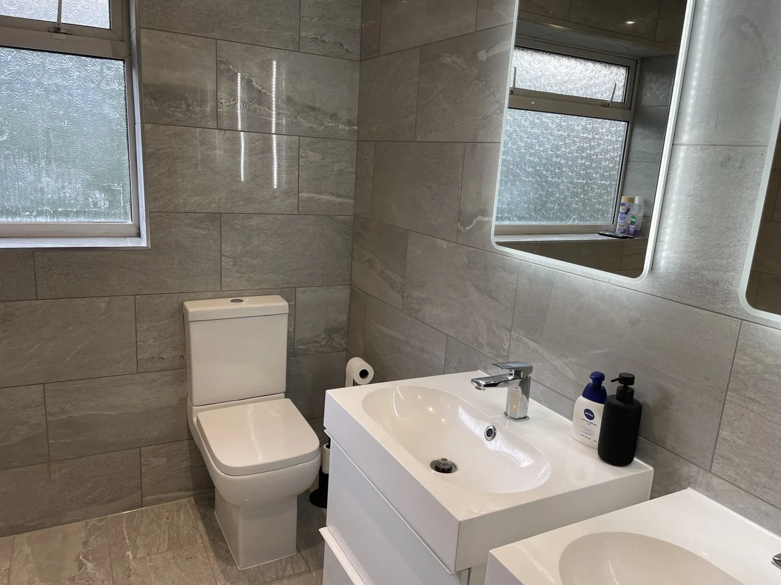Bathroom renovation with basin and shower